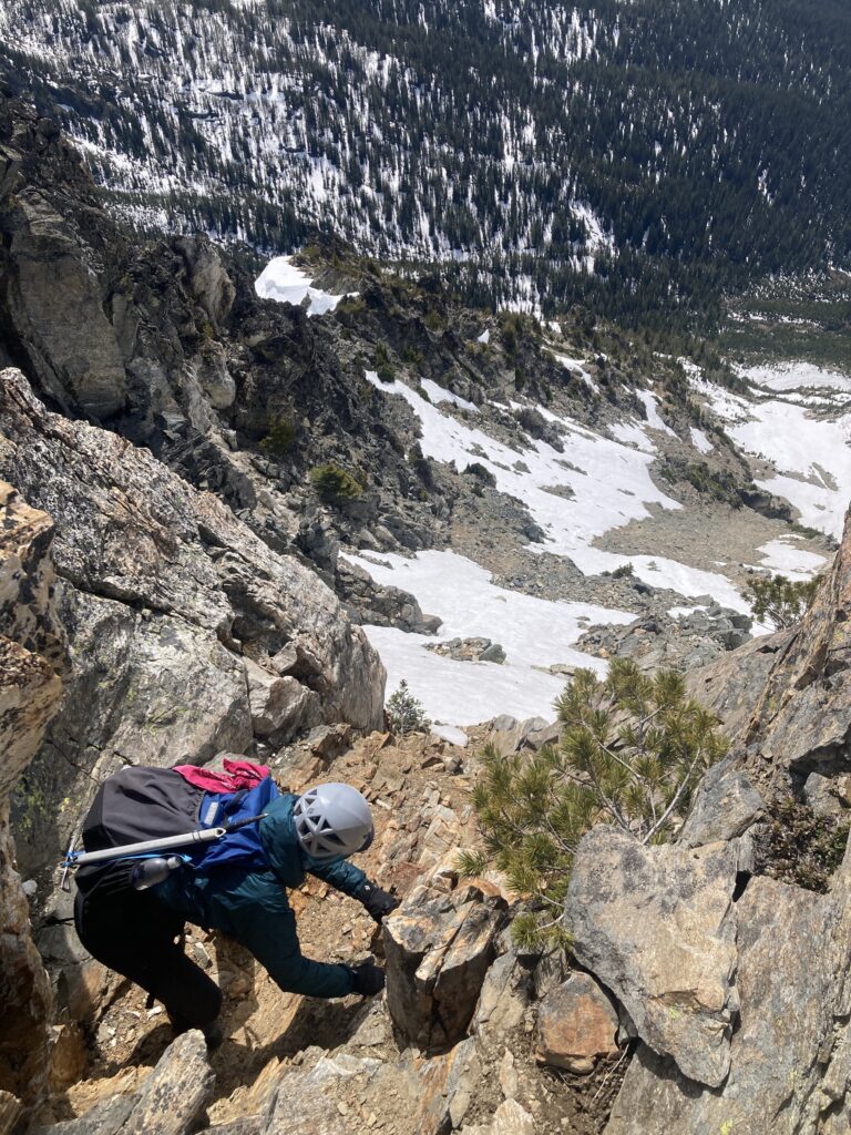 Carolyn climbing down steep slopes on Saska Peak in the Entiats