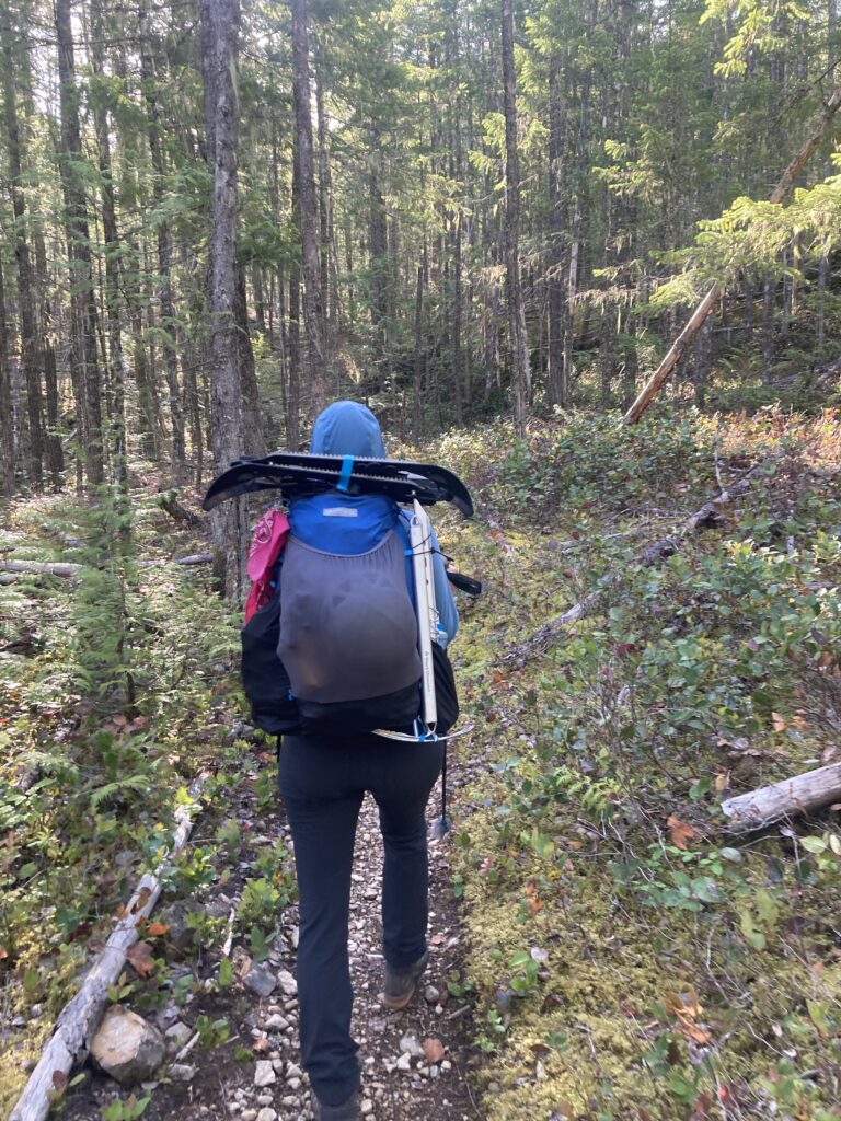 Hiking on the Pyramid Lake Trail toward Snowfield Peak in North Cascades National Park.