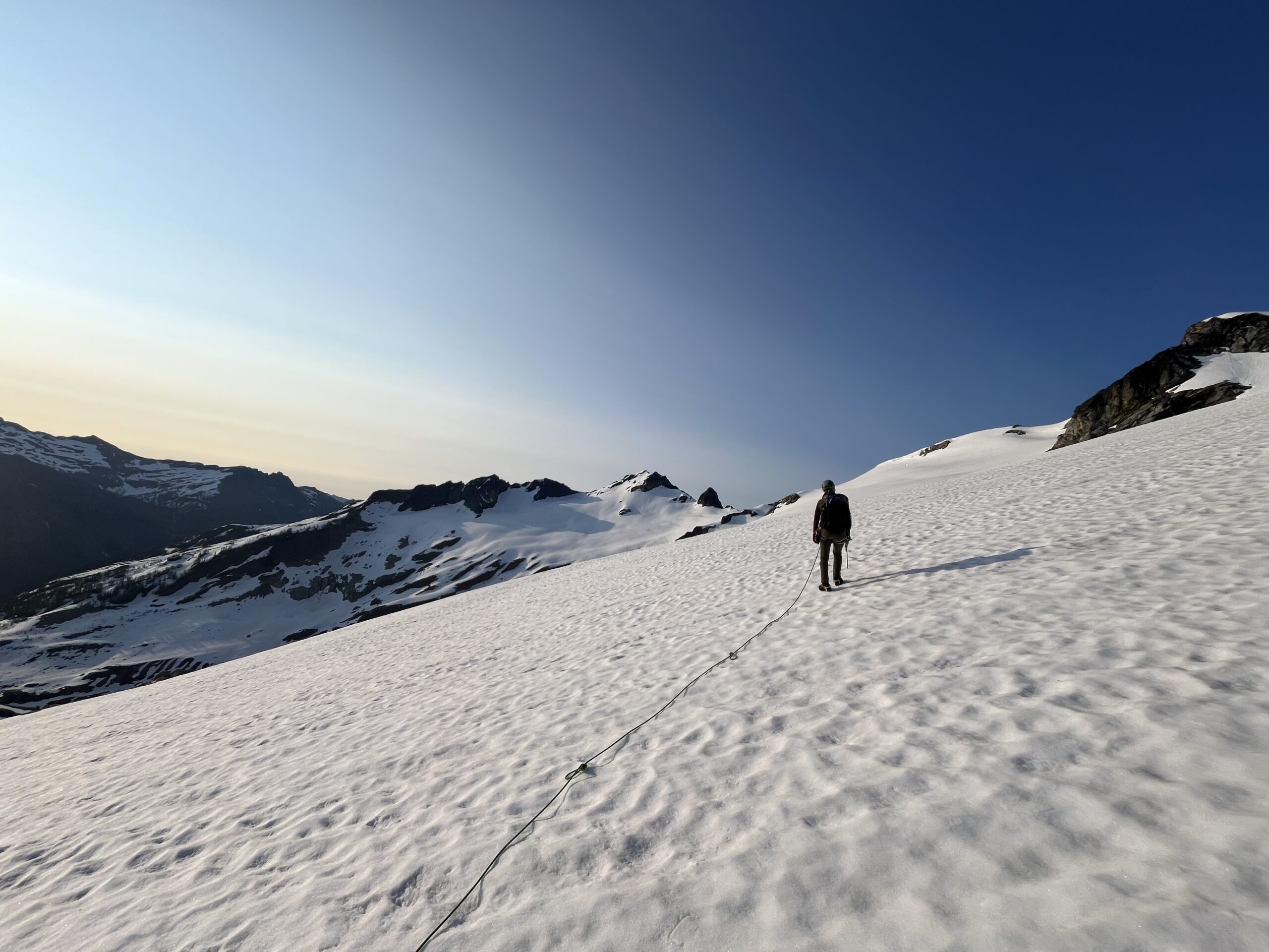 Carolyn mountaineering on the Moth Glacier in the Glacier Peak Wilderness in Cascades of Washington State