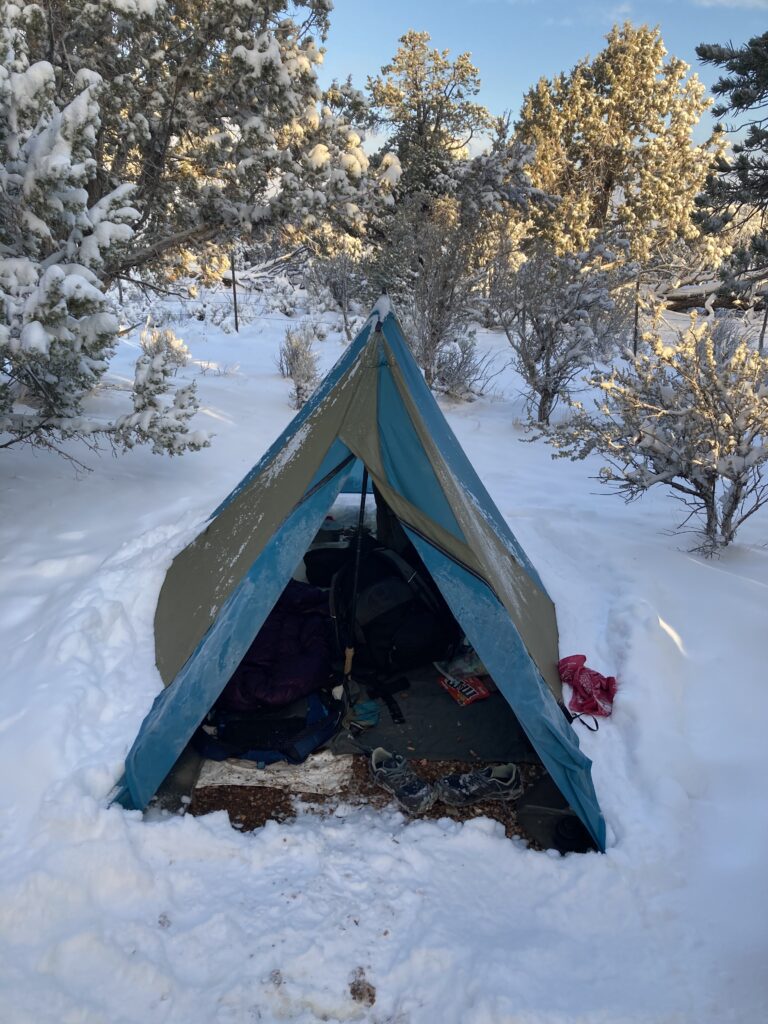 Snowstorm on hikers tent on the Kaibab Plateau on the Hayduke Trail