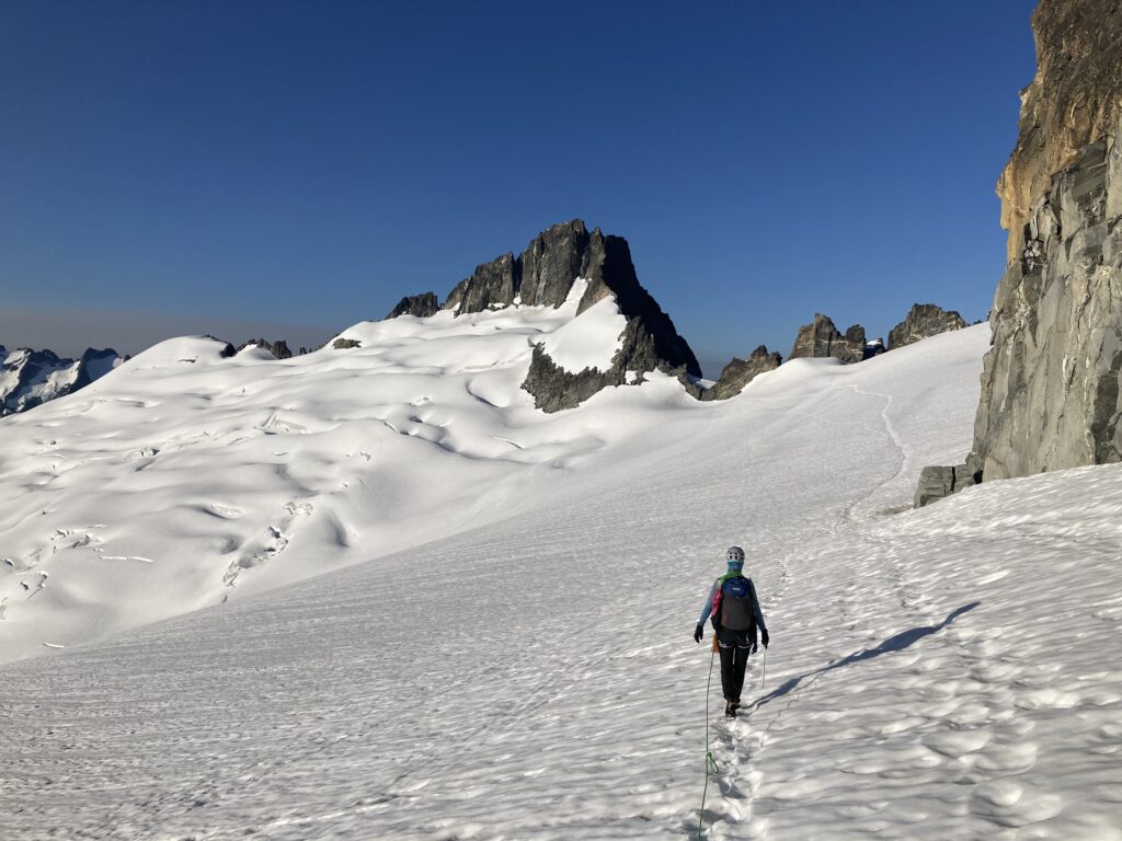 Carolyn walking on the Klawatti Glacier in the North Cascades along the Inspiration Traverse