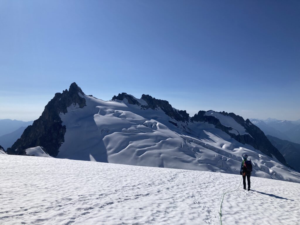 Carolyn enjoys the view of the Dorado Needle as we cross onto the Inspiration Glacier