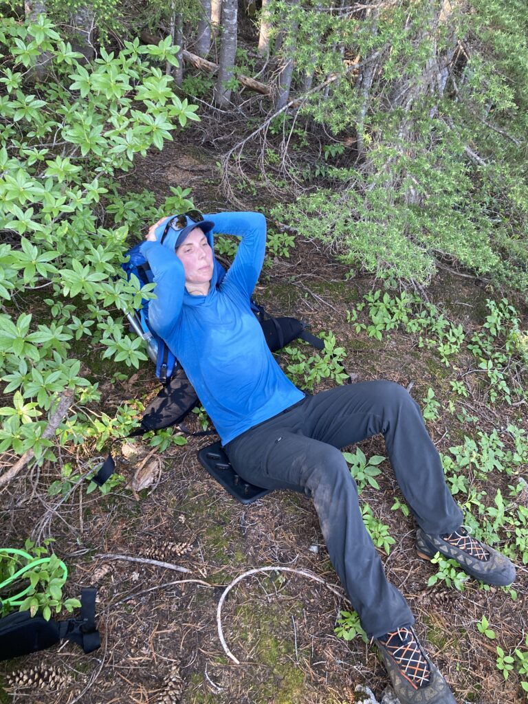 Carolyn taking a break while sweating alot as she makes her way up the Lucky Ridge climbers trail