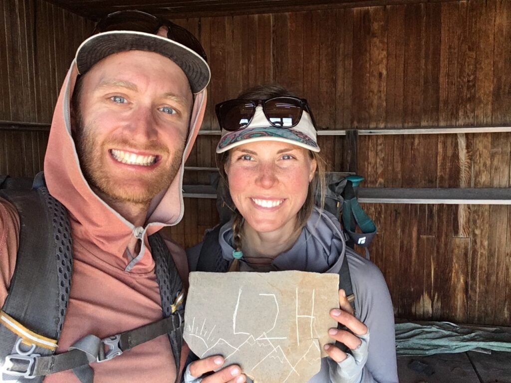 Low 2 High inscription carved into desert rock along the route