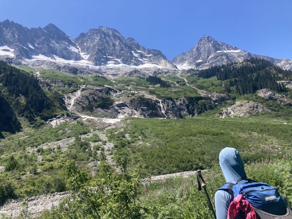 Carolyn looking up at the approach to Mt. Goode in the North Cascades of Washington state