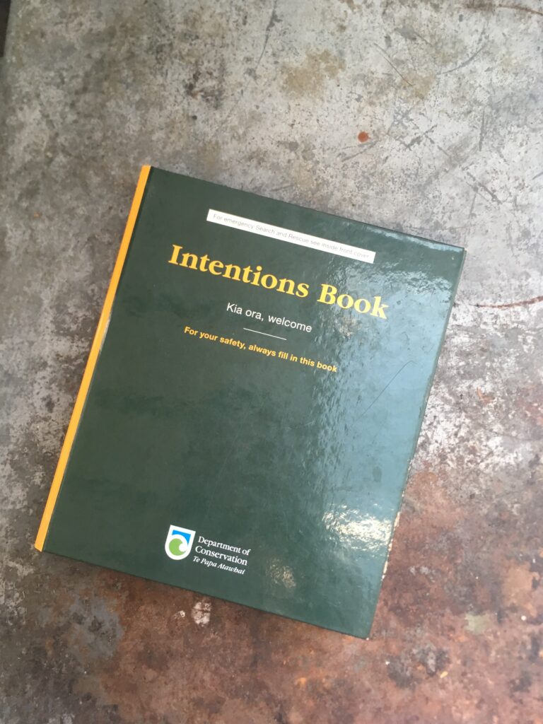 New Zealand DOC intentions book at a backcountry hut