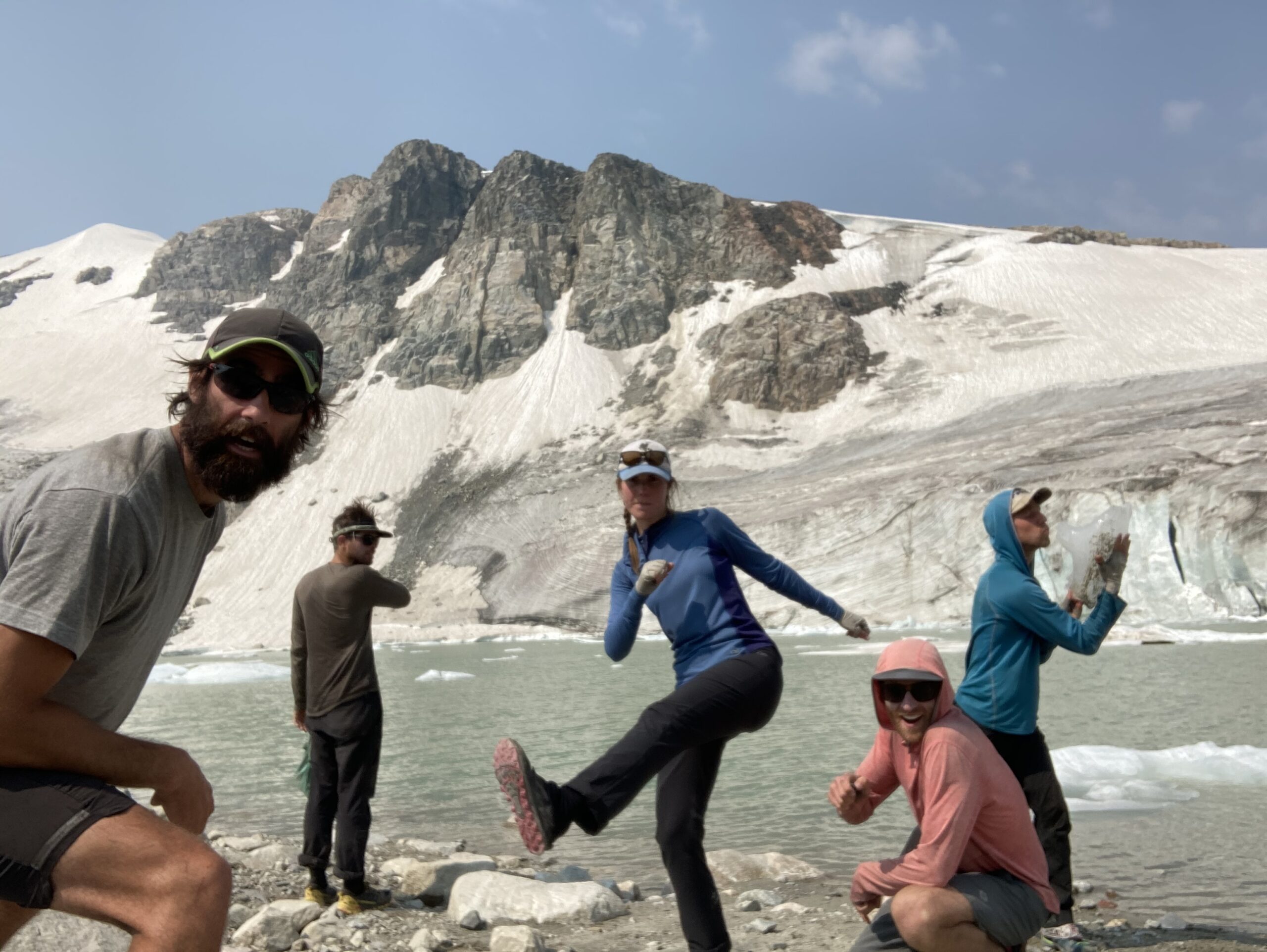 Group of hikers near a glaciated lake on the Wind River High Route