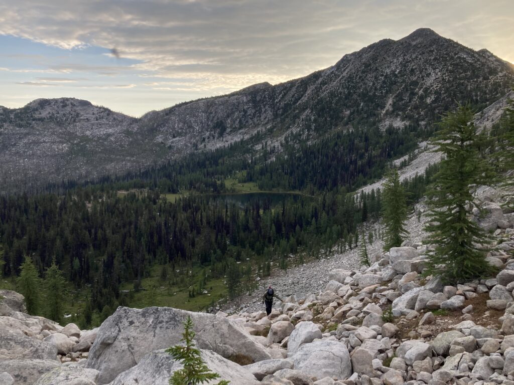 Carolyn hiking above Peepsight Lake on the Cougar Traverse