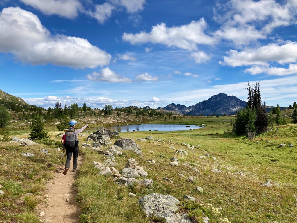 Carolyn and the view of Remmel in the northern section of the Cougar Traverse