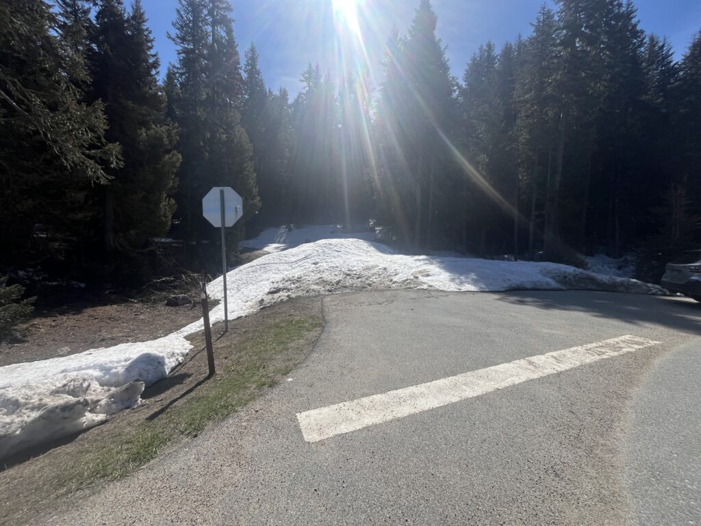 Snow covering road at Rainy Pass