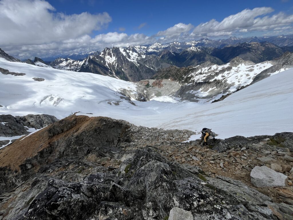 Carolyn on fina scramble up West ridge of Sinister Peak