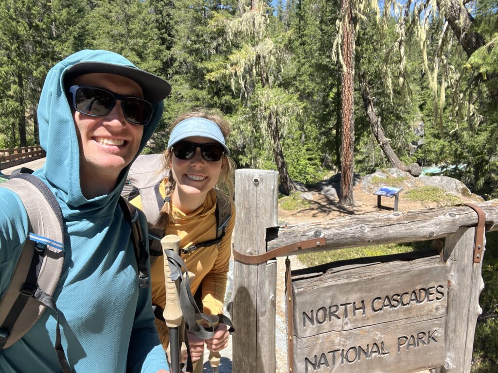 Selfie by the sign at High Bridge in North Cascades National Park