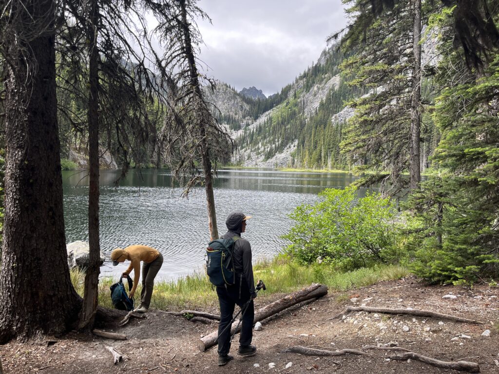 Hikers taking a break at Nada Lakes in the Enchantments of Washington State