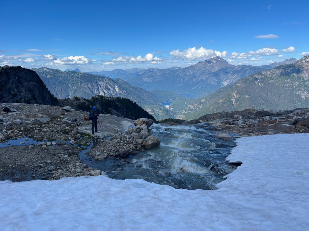 Water flowing from Colonial Lake in the North Cascades while along the Isolation Traverse