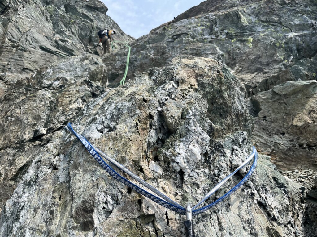 Second rappel station off the Mount Shuksan summit in the North Cascades