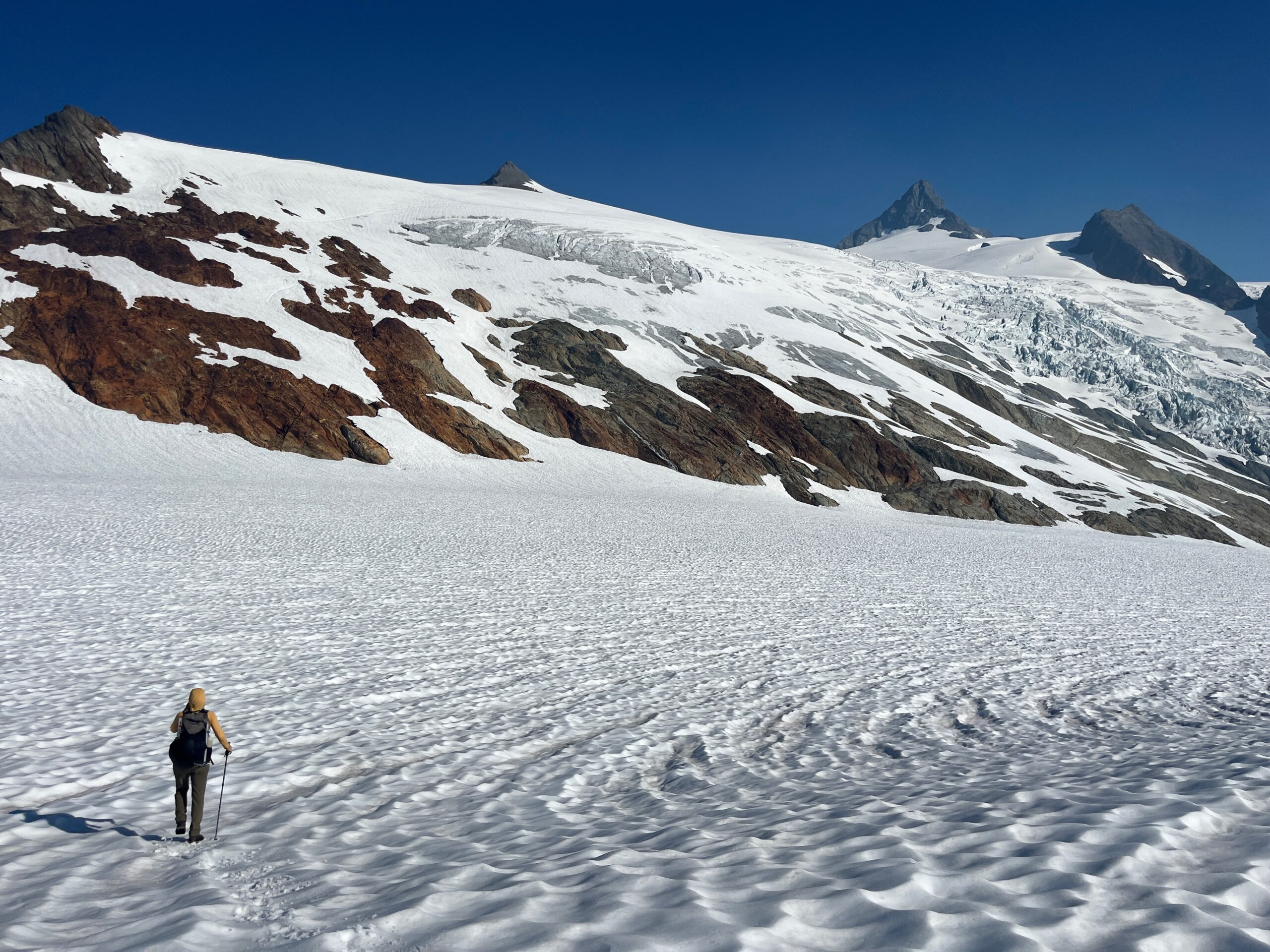 Carolyn hiking towards the Sulphide Glacier while climbing Mount Shuksan