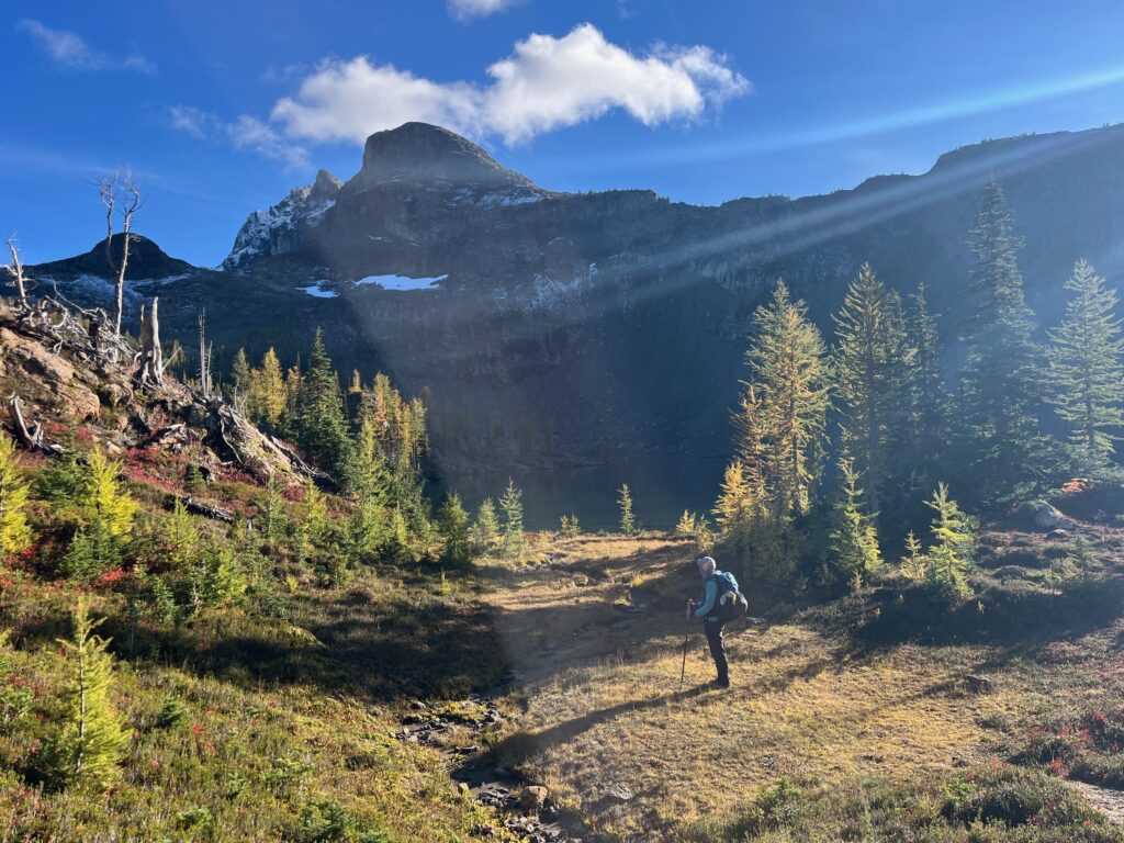Carolyn posing in the sunlight at Jerry Lakes in the North Cascades of Washington State