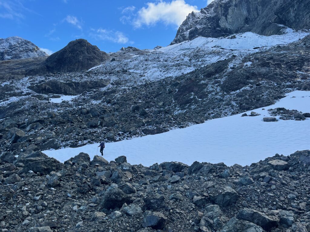 Carolyn hiking on talus in North Cascades, Washington State