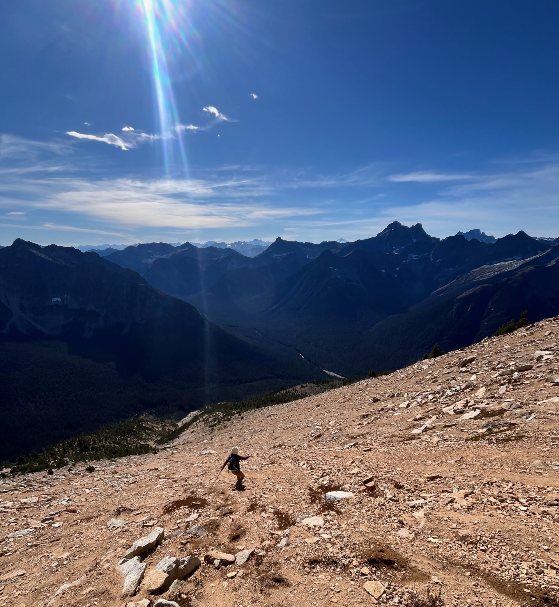 Carolyn headed down the scree slope on the south side of Mount Hardy
